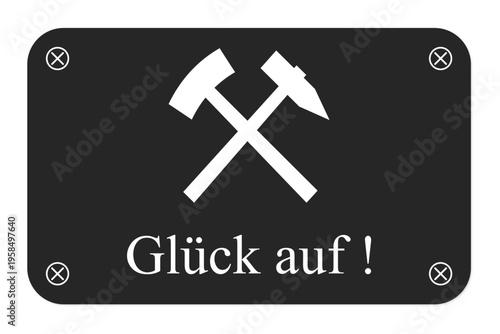 Glück auf - Schild mit gekreuztem Hammer und Schlägel auf schwarzem Hintergrund