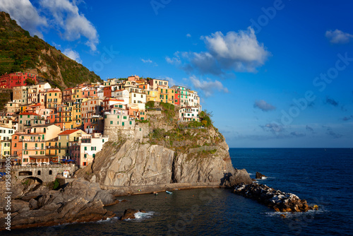 Wallpaper Mural Manarola village on cliff rocks and sea at sunset., Seascape in Five lands, Cinque Terre National Park, Liguria Italy Europe Torontodigital.ca
