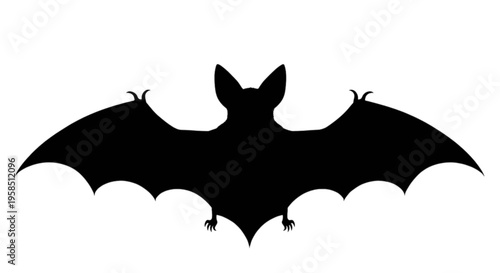 Black silhouette of a bat in flight with outstretched wings