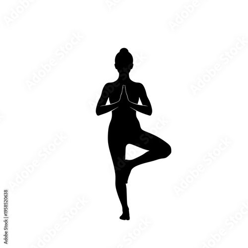 Woman in yoga tree pose silhouette.
