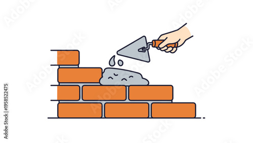 Construction worker hand using a metal trowel to apply mortar on a brick wall during a building renovation project.