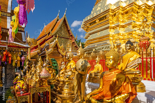 Chiang Mai, Thailand – Golden Buddha statues at Wat Phra That Doi Suthep Temple, the most famous temple near Chiang Mai.