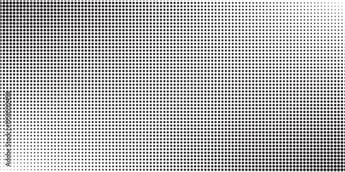 Dotted halftone gradient texture. Fading polka dot background. Repeated dots gradation pattern background. Black vanishing comic pop art overlay backdrop.