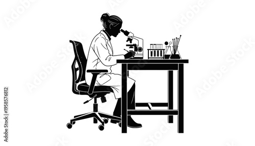 A scientist works with a microscope at a laboratory table.