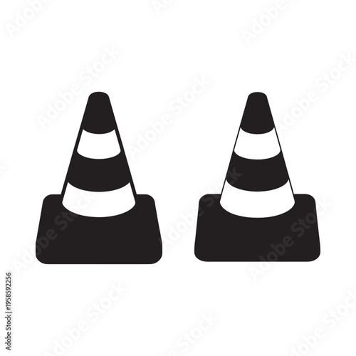 Two black and white traffic cones isolated on a plain white background