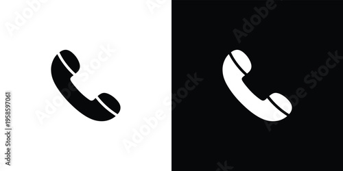 Black and white telephone receiver on split background symbol