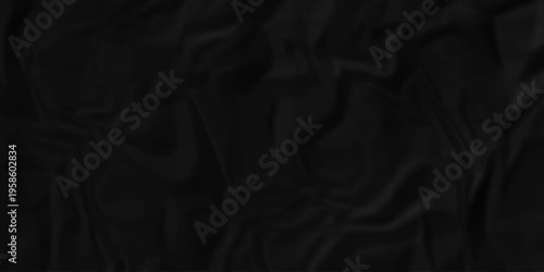 Crumple crushed black paper obsolete rumple craft design. wrinkle ripped creased crumple aged closeup recycled document grunge paper background.