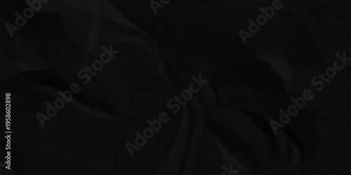 Crumple crushed black paper obsolete rumple craft design. wrinkle ripped creased crumple aged closeup recycled document grunge paper background.
