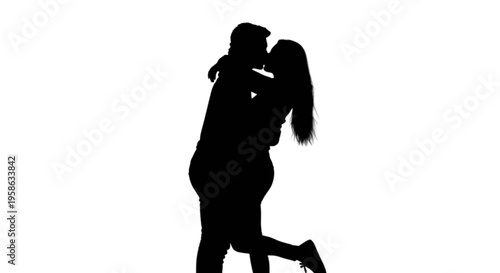 Romantic silhouette of a couple sharing a kiss