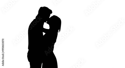 Silhouette of a romantic couple sharing a tender kiss
