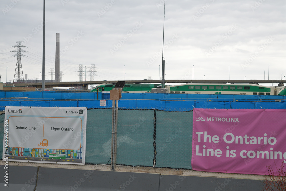 Obraz premium barrier fence with banners at the construction site of East Harbour, Ontario Line, Toronto (Lower Don)