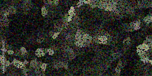 Vibrant speckled abstract background with a dark base and clusters of colorful dots in green, blue, red, and yellow creating a lively and energetic mosaic effect