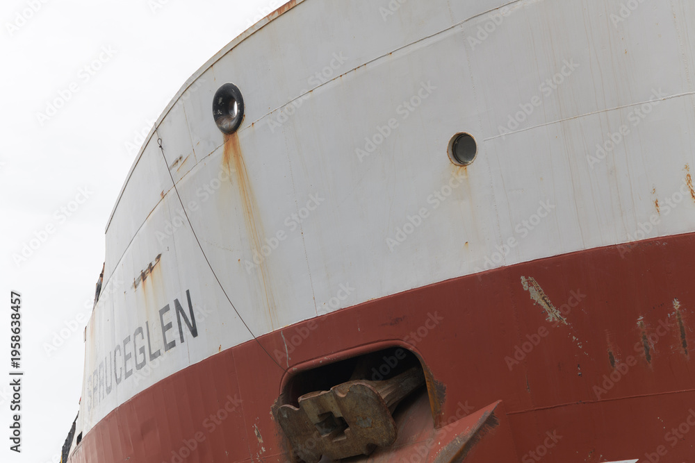Fototapeta premium Spruceglen, a bulk carrier, owned by Canada Steamship Lines (CLS), at Redpath Sugar Refinery, docked at Lower Jarvis St slip, Toronto