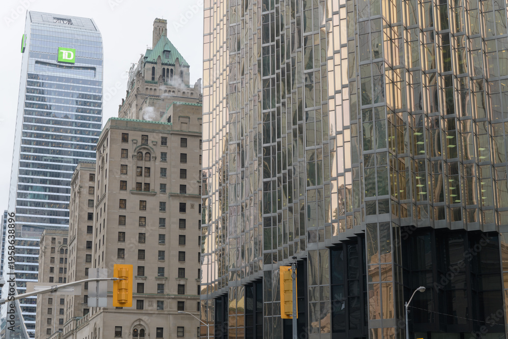 Fototapeta premium TD Terrace, Fairmont Royal York hotel and detail of Royal Bank Plaza, South Tower, looking west on Front St W from Bay St, Toronto