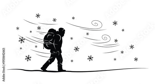 Winter hiker struggles against a blizzard carrying a large pack silhouette