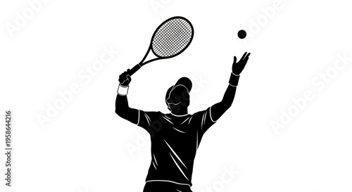 Silhouette of tennis player serving ball.