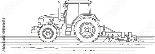 Tractor plowing a field in a rural landscape