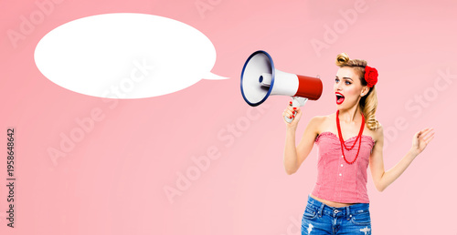 Expressive surprise shock pinup girl. Happy blond cute woman in pin-up cloths shout use mega phone megaphone ad advertisement. Isolated against pink background, mockup empty speech bubble speechbubble