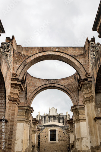 Wallpaper Mural Ancient stone ruins with arches and circular openings in Antigua Guatemala (architectural decay historical preservation) Torontodigital.ca