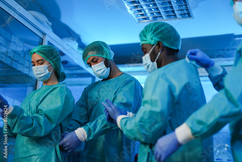 Картината върху платно Medical people prepare for operation inside hospital room - Surgery, multiracial