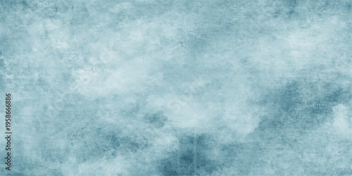 Blue grunge abstract sky texture with clouds and fog