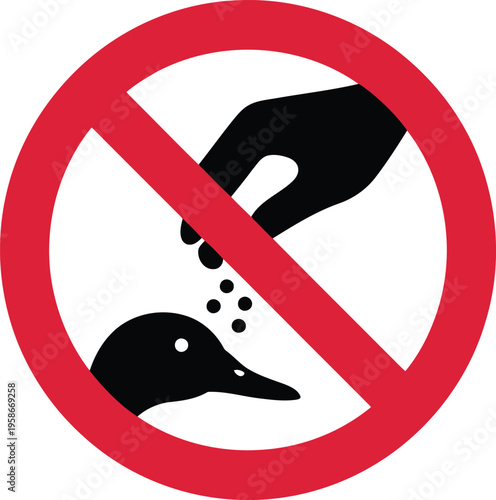 Red universal prohibition symbol prevents a human hand from feeding a black silhouette duck small food bits