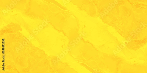 Yellow liquid marble background with vibrant fluid swirl texture and abstract golden acrylic paint patterns