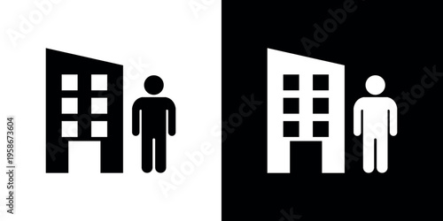 Black and white of people standing next to buildings