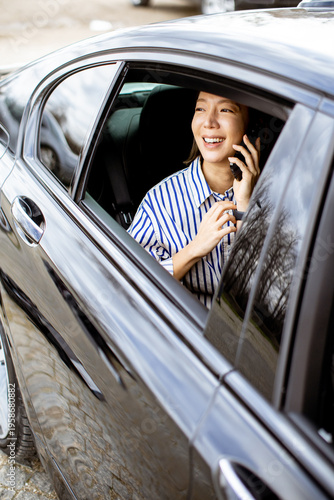 Korean woman talks on the p...