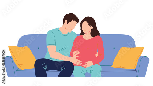 Loving couple sits together on a blue sofa as the man gently touches the belly of his pregnant wife in a heartwarming domestic scene.