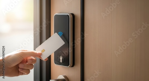 Woman hand using key card to unlock smart door lock. Electronic access control system for building security. Modern wireless entry technology for residential and commercial property.