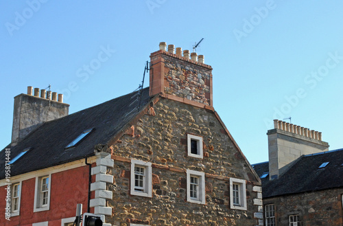 Stone Building with Gable and Chimney Stack