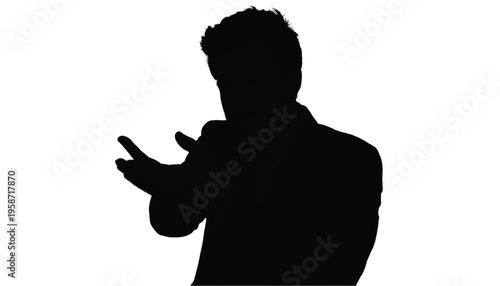 Silhouette of a gesturing male figure speaking or presenting something while facing away from the viewer.