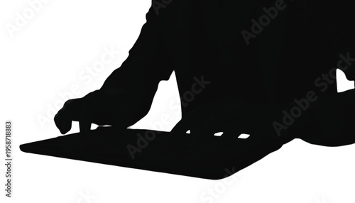 Silhouette of a person's hands typing on a flat electronic device or keyboard from a rear perspective.