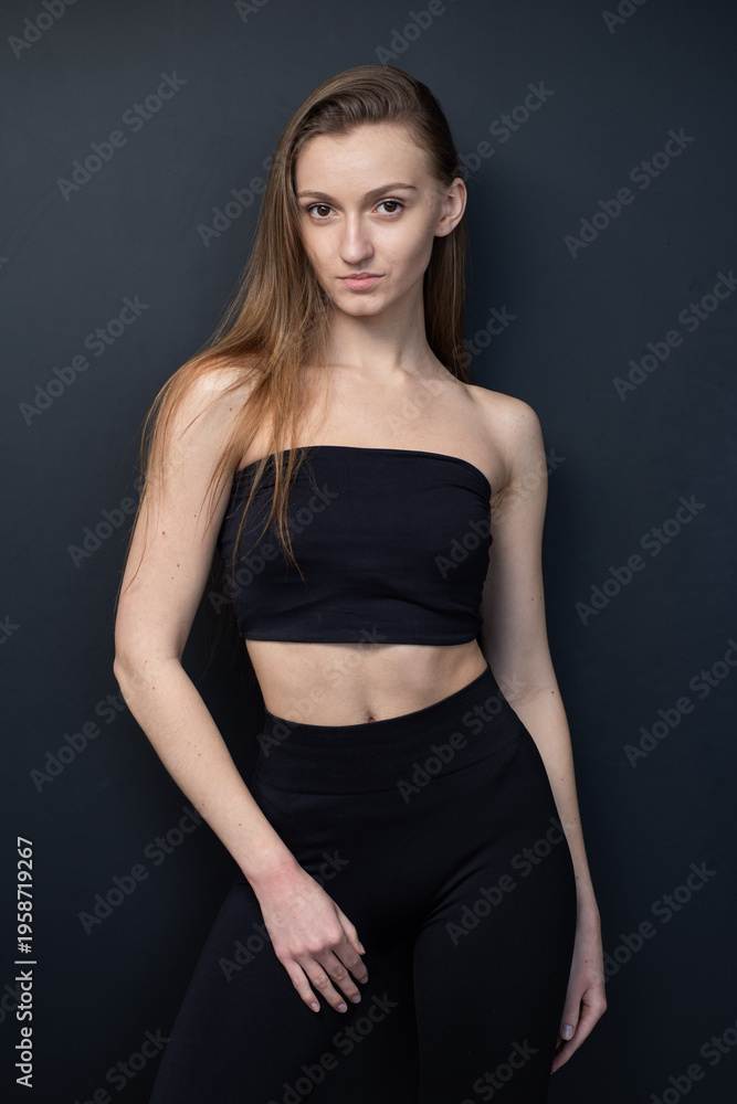 Fototapeta premium Professional model test shoot for agency submission. Natural beauty, minimal makeup, black wearing, clean background, confident poses. Perfect for portfolios, castings, and fashion