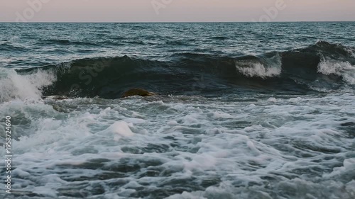 Slow motion waves breaking over rocks along the coast at Folhammar in Gotland, Sweden