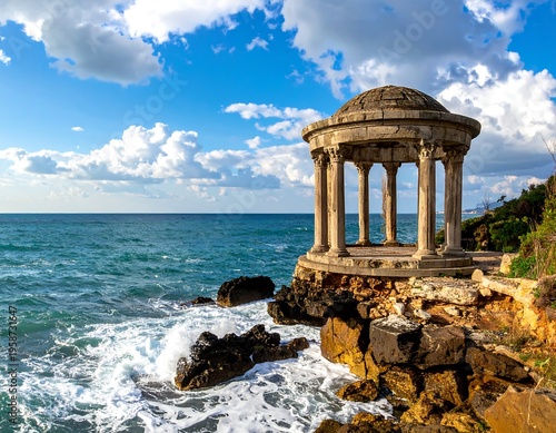 Seaside rotunda atop rocky cliff, ocean waves crashing, blue sky dotted with puffy clouds