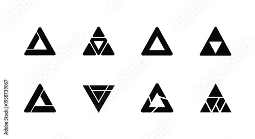Collection of geometric black triangles with varying internal cutouts and orientations