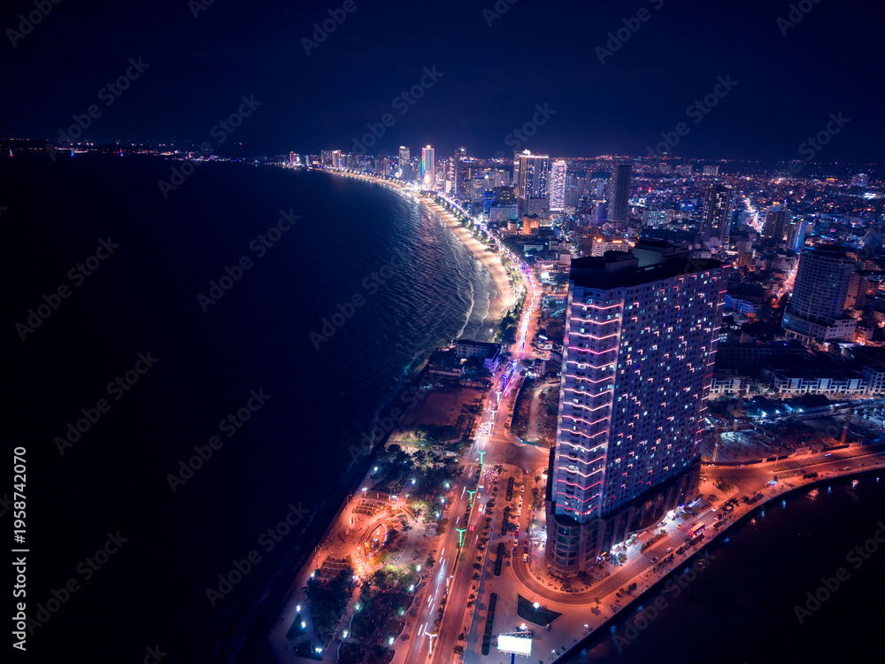 Fototapeta premium Aerial view night cityscape Nha Trang city and embankment of Sea Vietnam.
