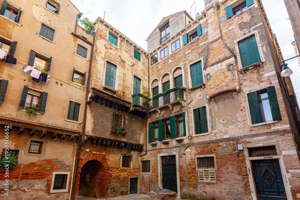 Fototapeta premium Streets and medieval architecture of Venice, Italy