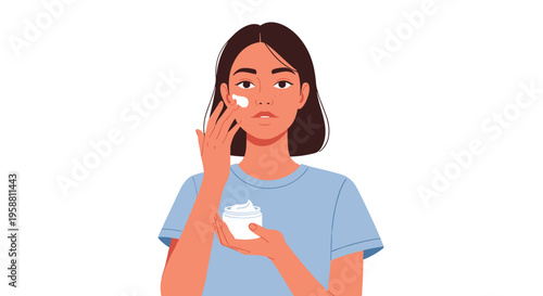 A young woman with short dark hair applies white cream to her cheek while holding a jar of cream.