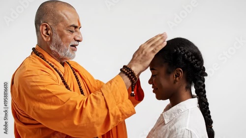 Spiritual Blessing Ceremony - Guru Places Hand on Forehead of Young Woman.