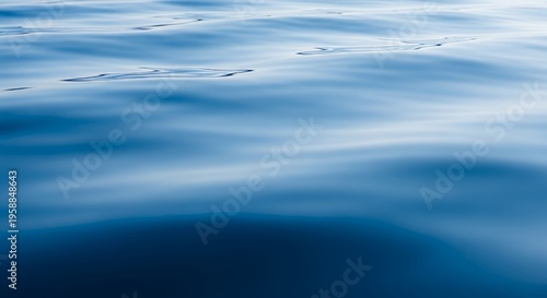 Close Up of Pink Lotus Blossom Floating on Rippled Water Surface Artistic Nature Photography for Relaxation Spa