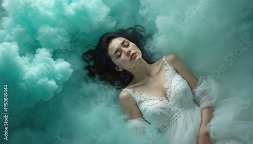 Young woman rests peacefully in ethereal teal smoke clouds, wearing delicate white dress. Eyes closed, embodying serene dreamlike state, ideal for fantasy wellness themes. Serene young woman slepic