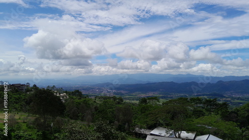 Expansive Mountain Landscape with Cloudy Sky View