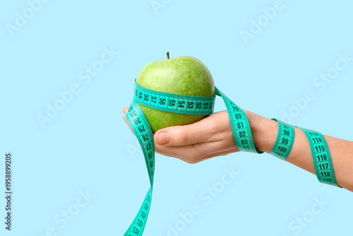 Female hand with fresh appl...