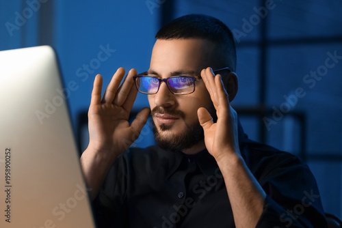Male trader with eyeglasses...
