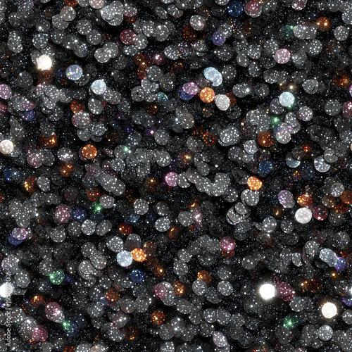 Shiny black sequin scatter with colorful reflections creates sparkling and festive texture perfect for decorative and fashion design projects
