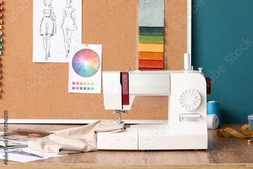 Tailor's workplace with sew...
