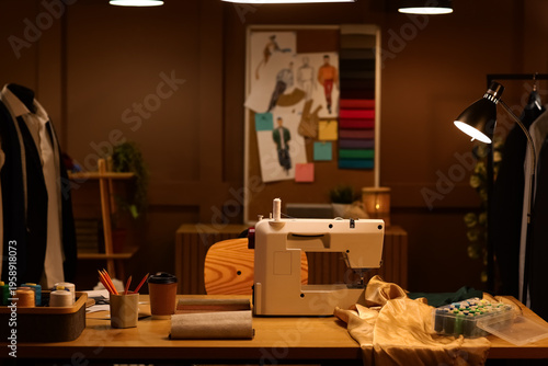 Tailor's workplace with sew...